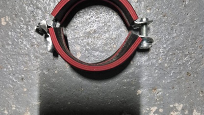 Red-lined rubber clamp